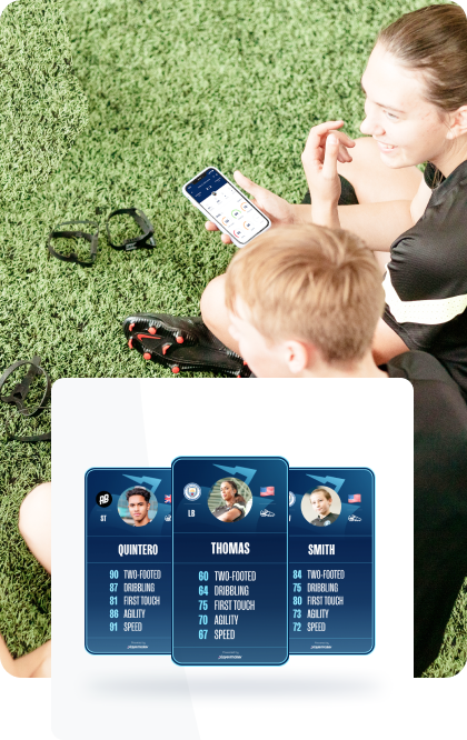 Woman and child sitting on grass with a tablet displaying sports player cards for Playermaker.
